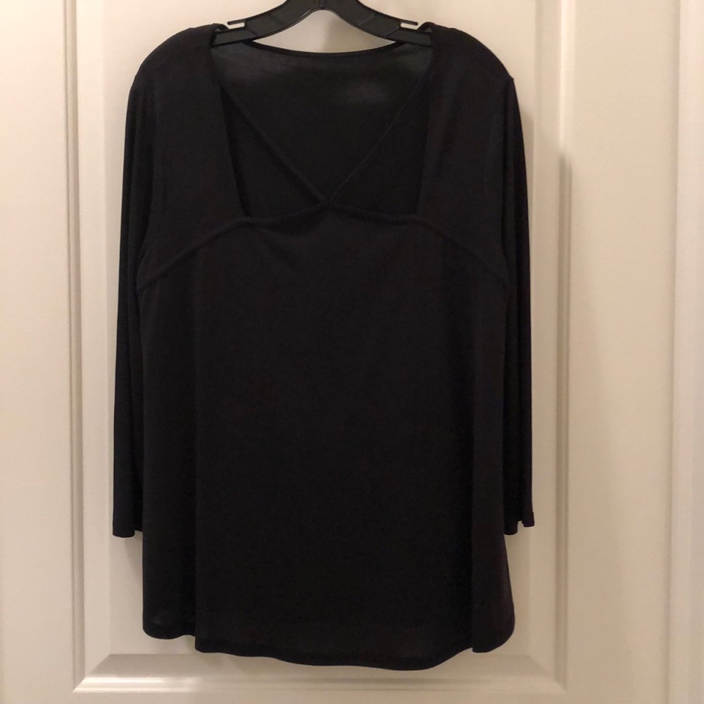 Flirty black top.